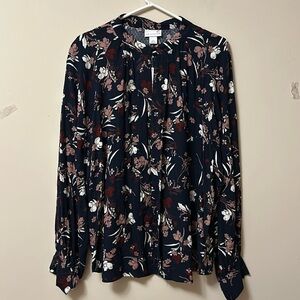 Liz Claiborne black blouse with a flower print bottom neck & cuffs size …